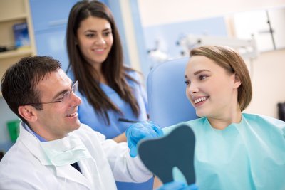 Girl sitting at the dentist's clinic