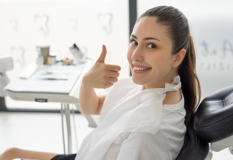 Happy patient after the dental implant treatment in Westlake, OH