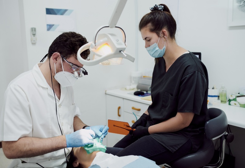 Dentist performing root canal treatment in Westlake, OH