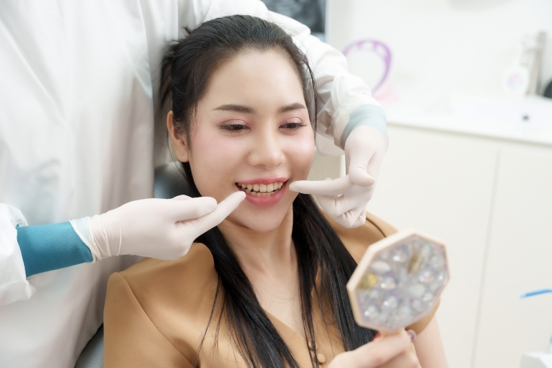 Dentist and patient interaction after successful facial asymmetry correction in Westlake, OH
