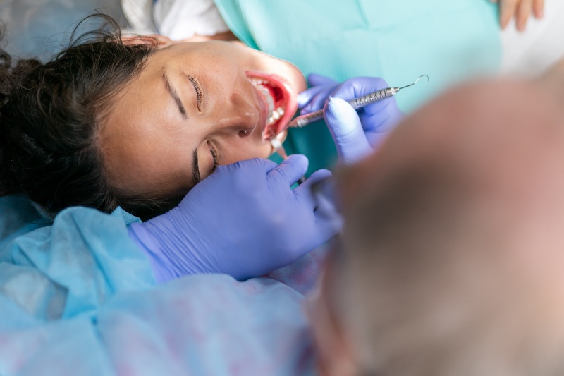 Periodontal cleaning treatment with dental tools in Westlake, OH